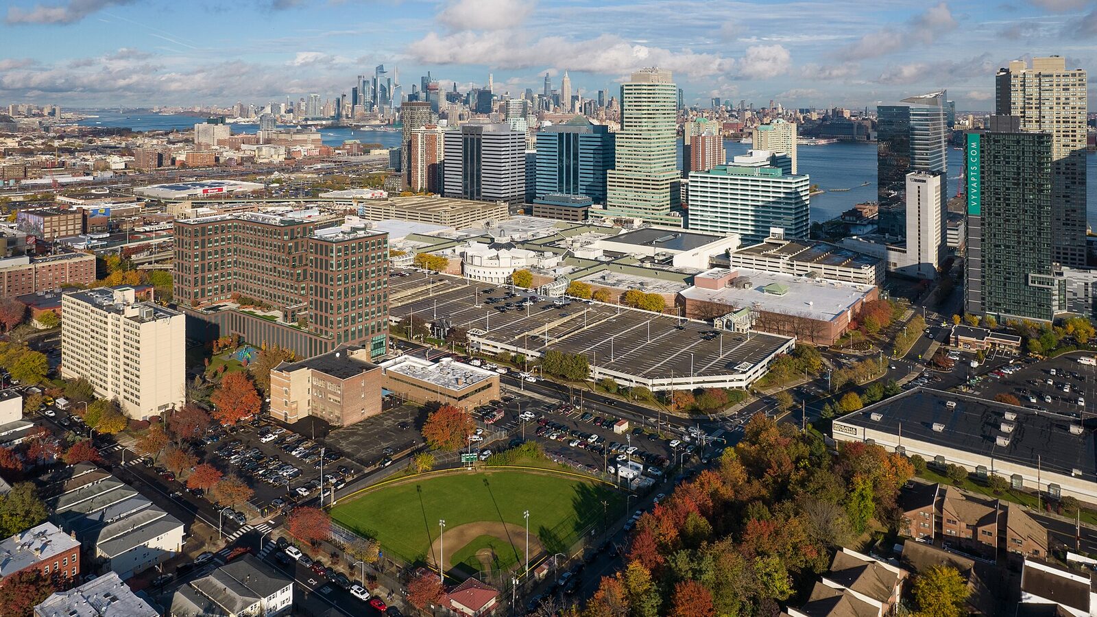 Newport, Jersey City, New Jersey, with parts of Hamilton Park in the foreground