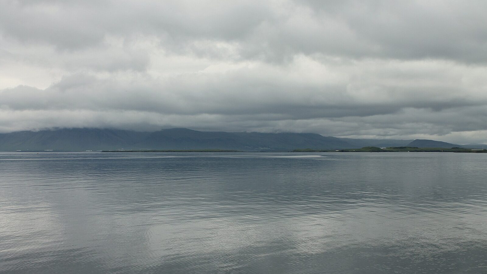 Reykjavík Harbor looking out to the sea and the mountains