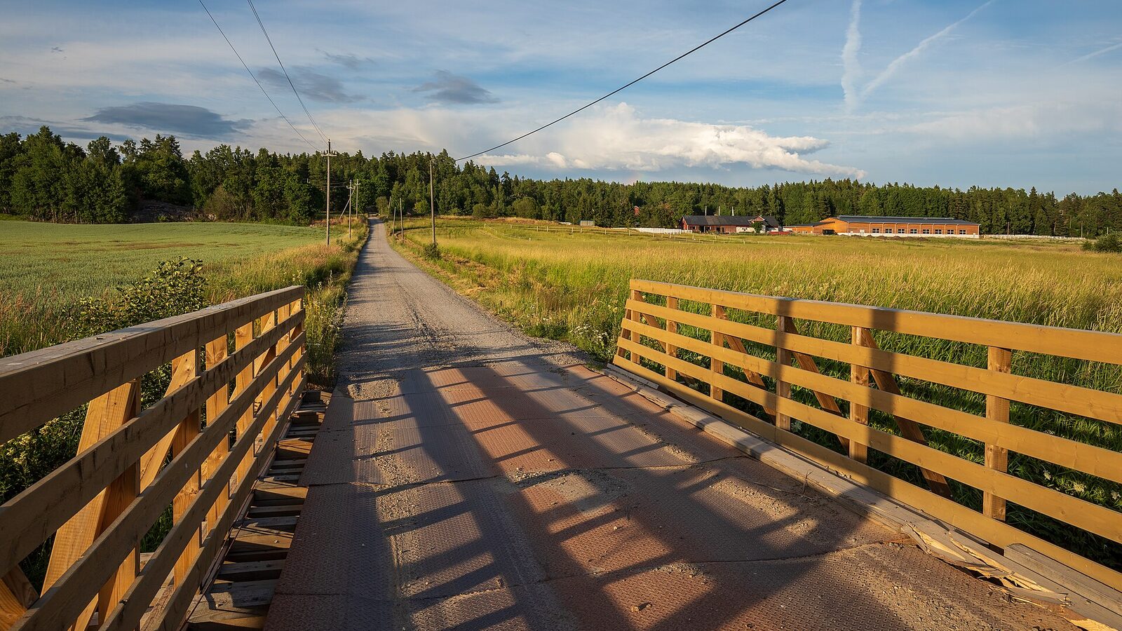 A small bridge of Susiraja road crosses Krapuoja river between Länsisalmi of Vantaa and Östersundom of Helsinki, Finland in 2022 July