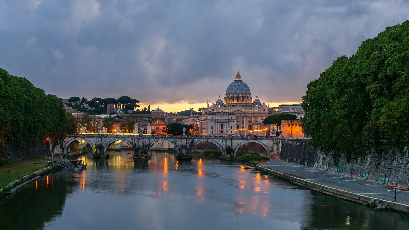 Sant'Angelo bridge (Ponte Sant'Angelo), Saint Peter's Basilica, at dusk, from Umberto I bridge, Rome, Italy