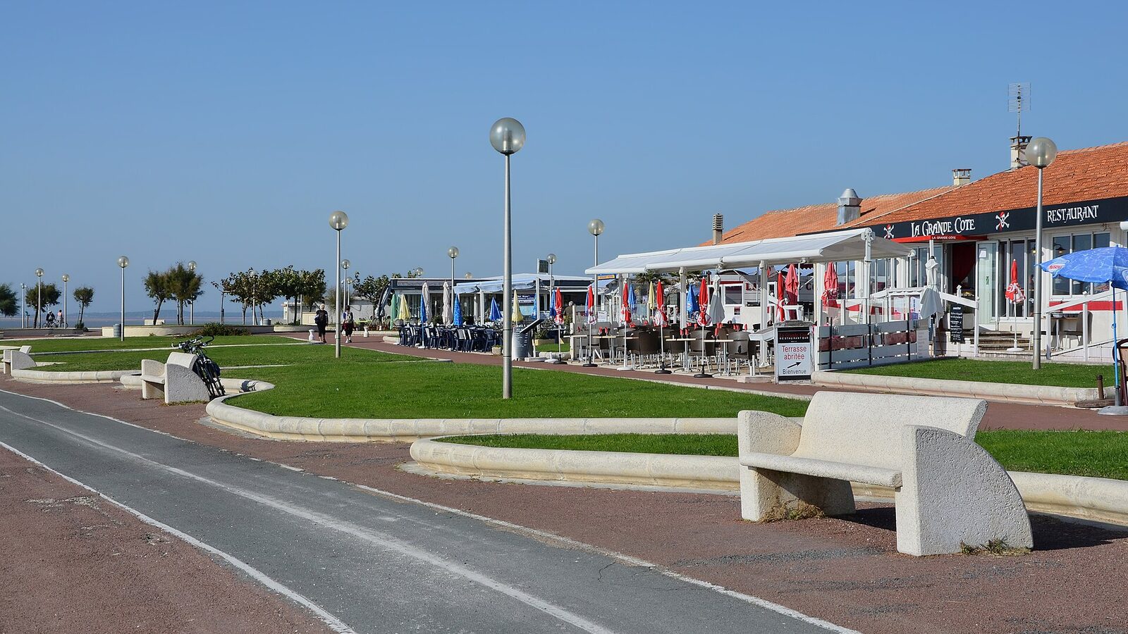 Bike path, lawns and terraces of cafés, la Grande Côte, Saint-Palais-sur-Mer, Charente-Maritime, France