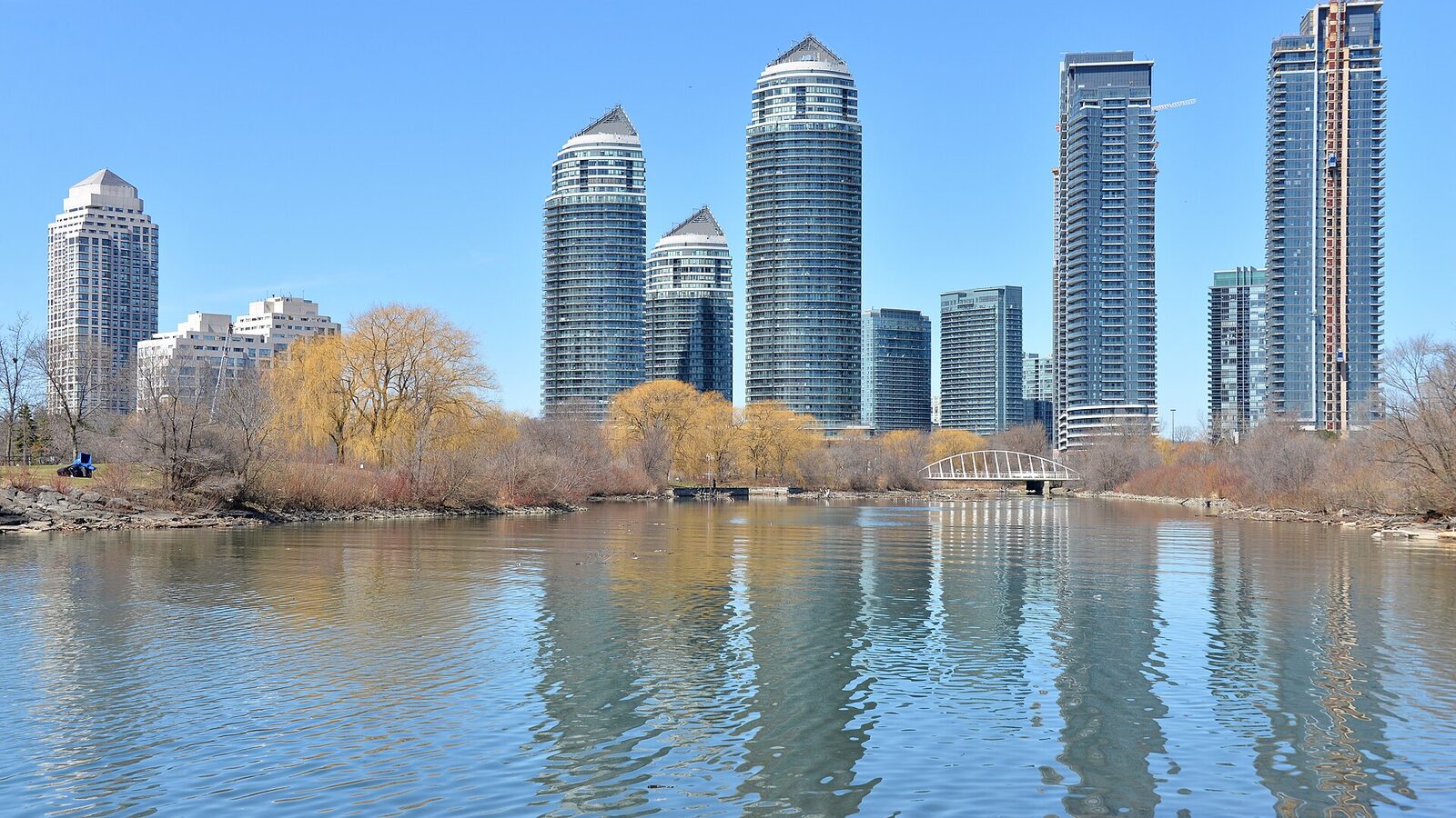 Humber Bay Park East on the shore of lake Ontario by the mouth of Humber river in Toronto, Ontario with apartment buildings in background