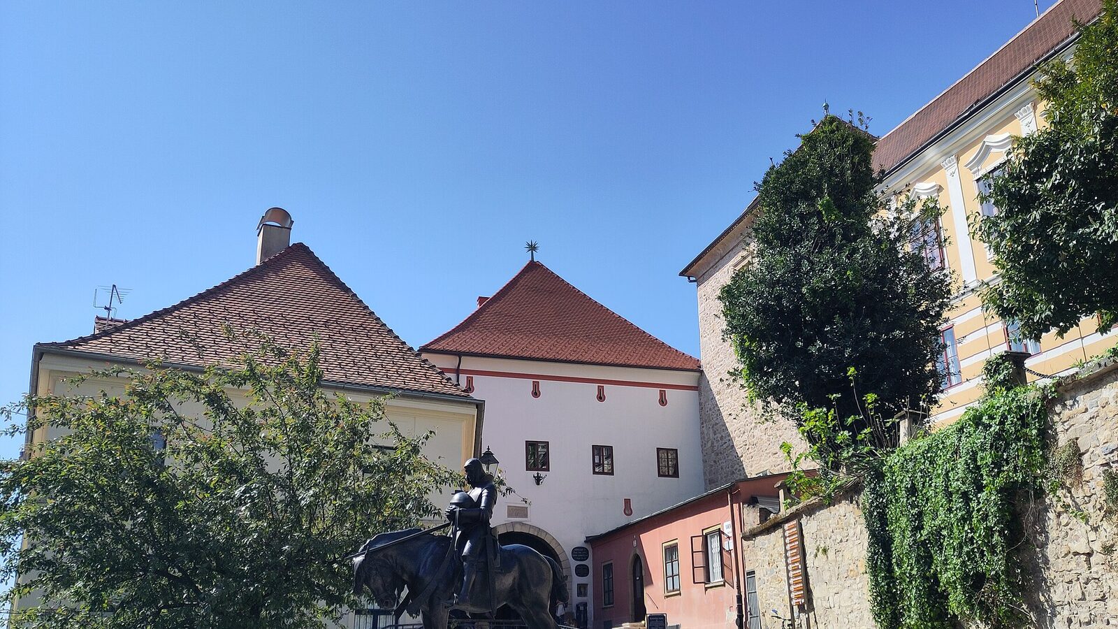 Statue of saint Georges and medieval gate of the old town in Zagreb