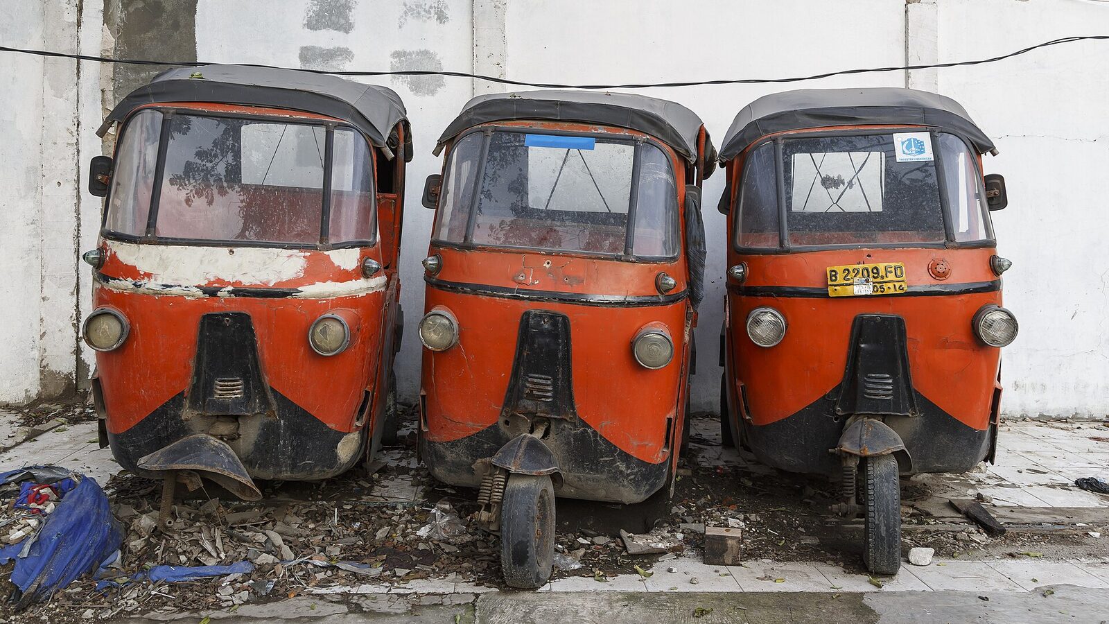 Jakarta, Indonesia: Abandoned motor rickshaws in Old town Jakarta