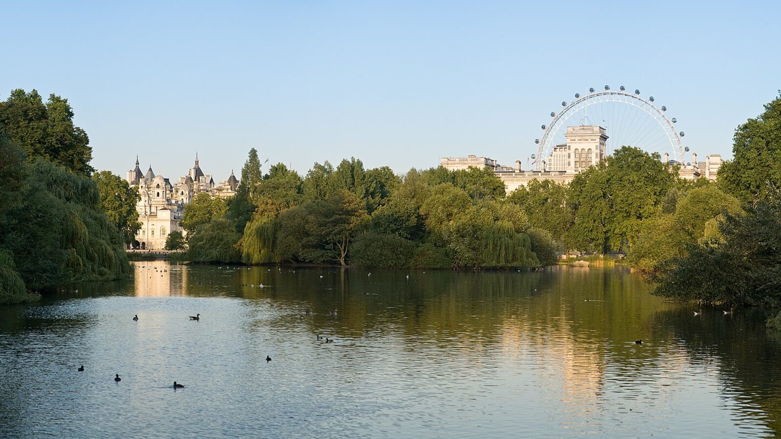 A 6 segment panoramic view of St James's Park Lake, looking east. The Shell Tower and the London Eye can be seen behind the Foreign and…